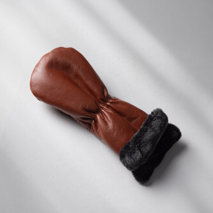Detailed stitching and full-grain genuine leather texture on golf driver headcover.