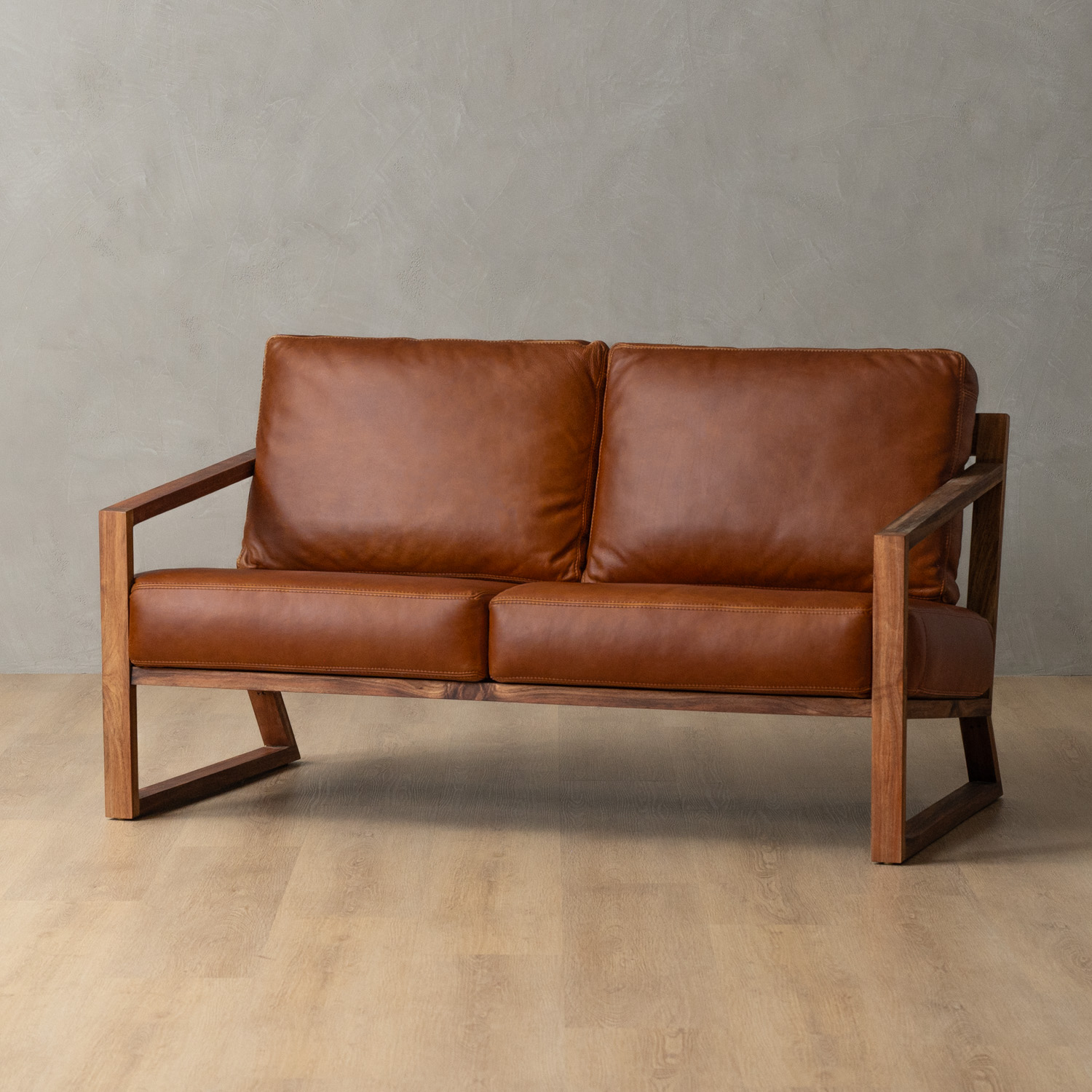 clarens-2-seater-leather-couch-blackwood-butterscotch