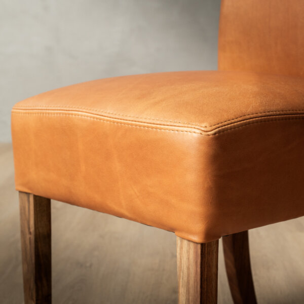 https://incanda.co.za/products/dining-room-seating/chunky-leather-dining-chair-oak-naku-butterscotch/